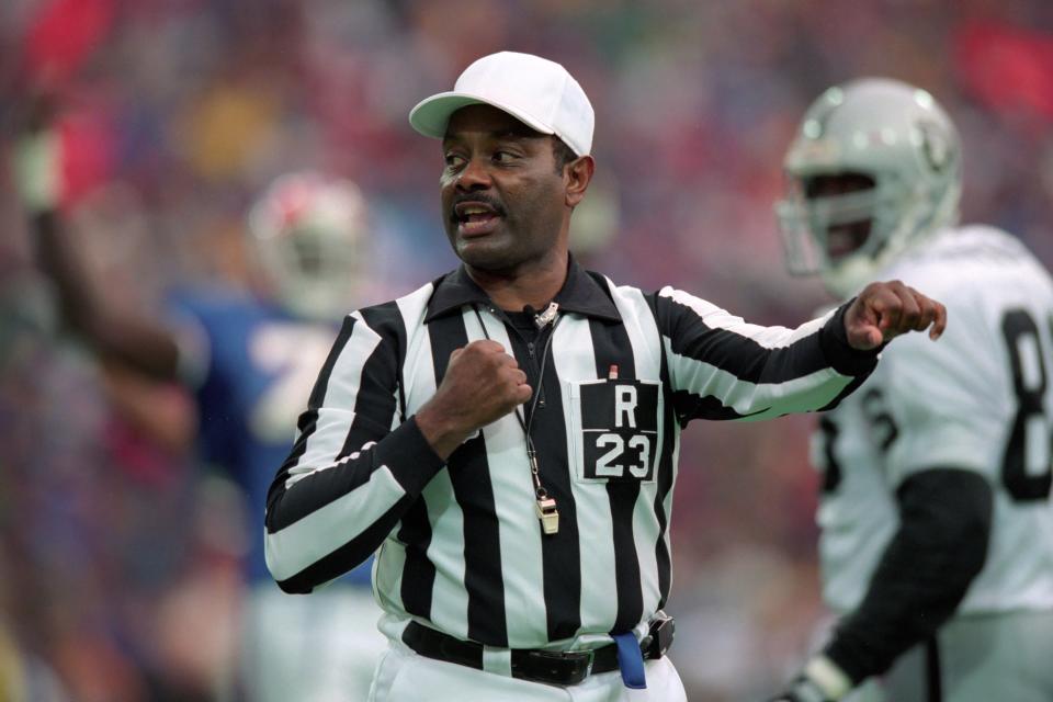 ORCHARD PARK, NY - OCTOBER 17:  NFL referee Johnny Grier signals during a game between the Oakland Raiders and Buffalo Bills at Ralph Wilson Stadium on October 17, 1999 in Orchard Park, New York.  (Photo by George Gojkovich/Getty Images)