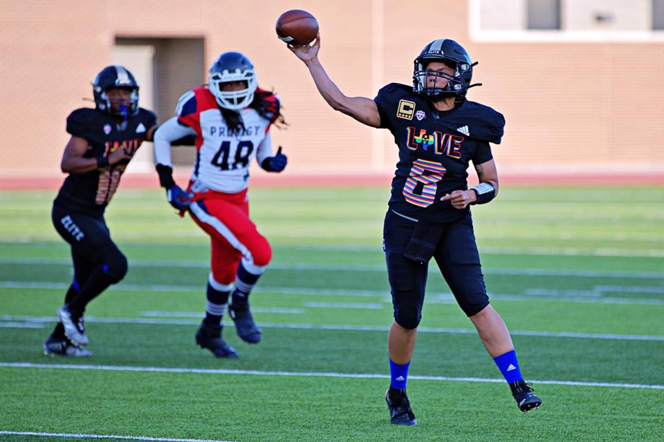 Texas Elite Spartans quarterback Brittany Bushman, right, was named Most Valuable Player of the Women’s National Football Conference in 2022.