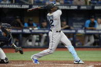 Miami Marlins' Jorge Soler (12) follows the flight of his solo home run off Tampa Bay Rays starting pitcher Drew Rasmussen during the fourth inning of a baseball game Wednesday, May 25, 2022, in St. Petersburg, Fla. (AP Photo/Chris O'Meara)