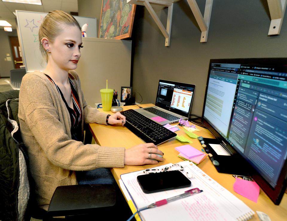 Meghan Burrell of Miller Mid-America works on a client policy at the Innovate Springfield incubator on Tuesday. Innovate Springfield will move into the University of Illinois Springfield's new Innovation Center at Fourth and Washington streets in 2025.