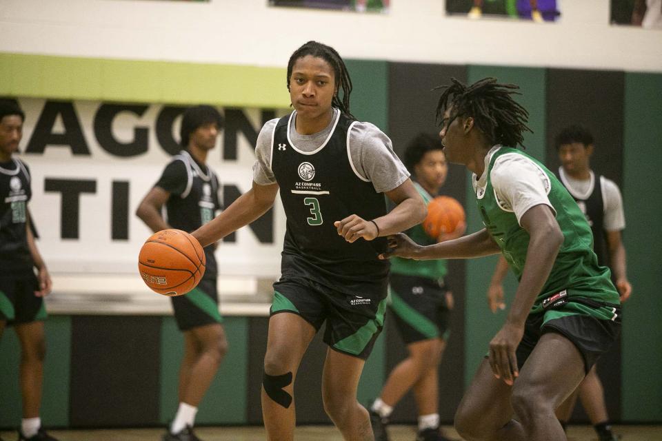 March 26, 2021; Chandler, AZ, USA; TyTy Washington Jr. dribbles the ball during his team's practice at the AZ Compass Prep gym on March 26, 2021.