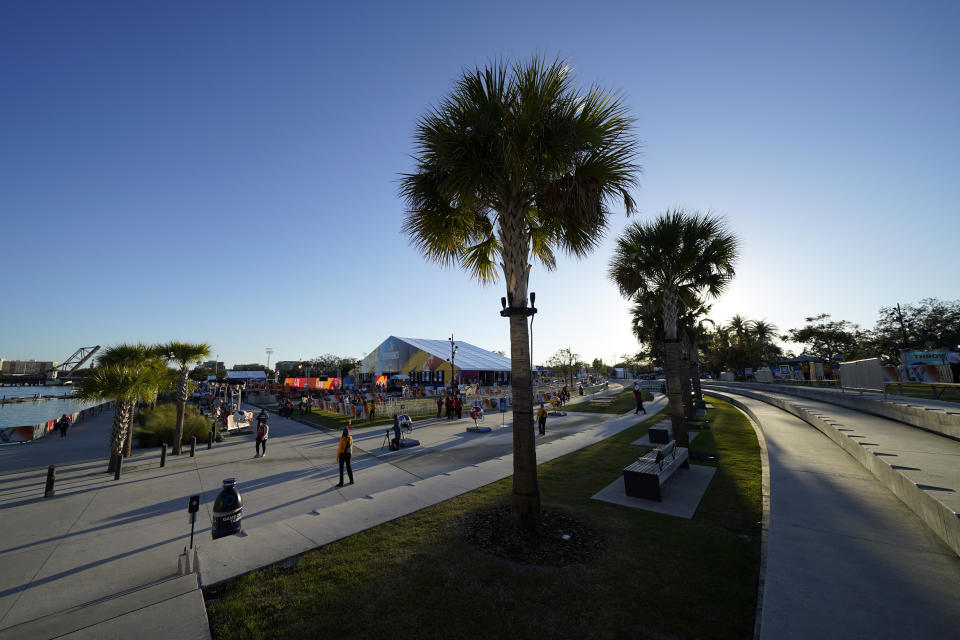 Fans attend the NFL Experience for Super Bowl LV Friday, Jan. 29, 2021, in Tampa, Fla. (AP Photo/David J. Phillip)