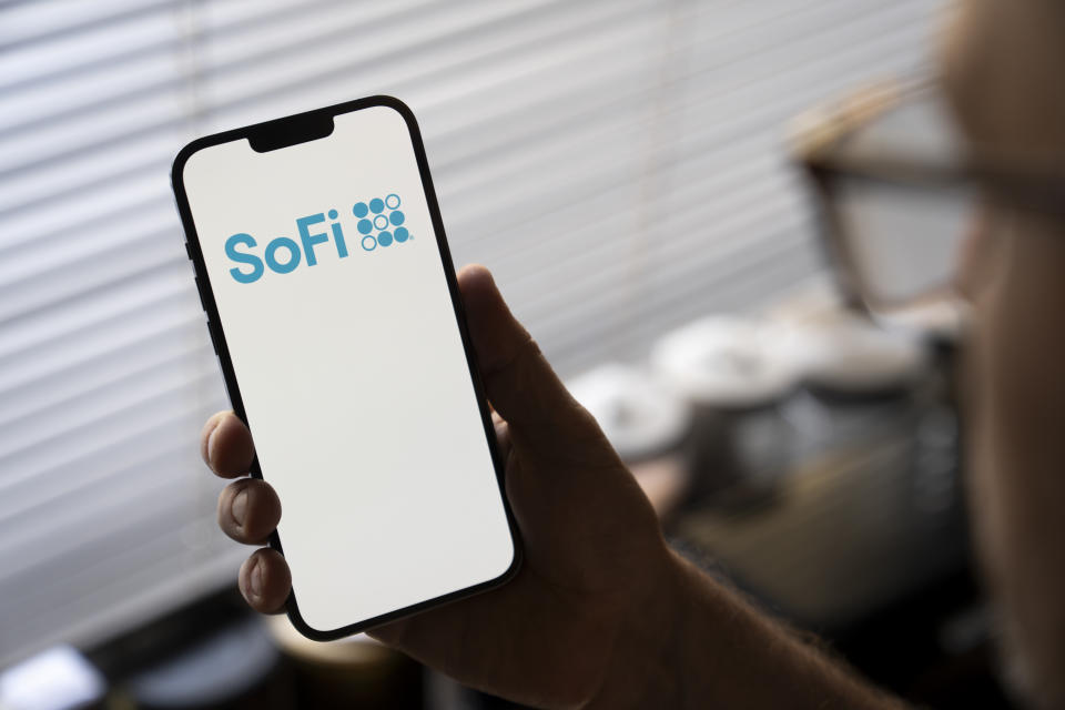 The SoFi bank logo is seen on a mobile device screen in this illustration photo on 14 July, 2023. (Photo by Jaap Arriens/NurPhoto via Getty Images)