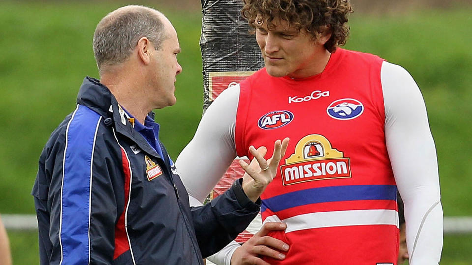 Rodney Eade and Will Minson in 2011. (Photo by Hamish Blair/Getty Images)