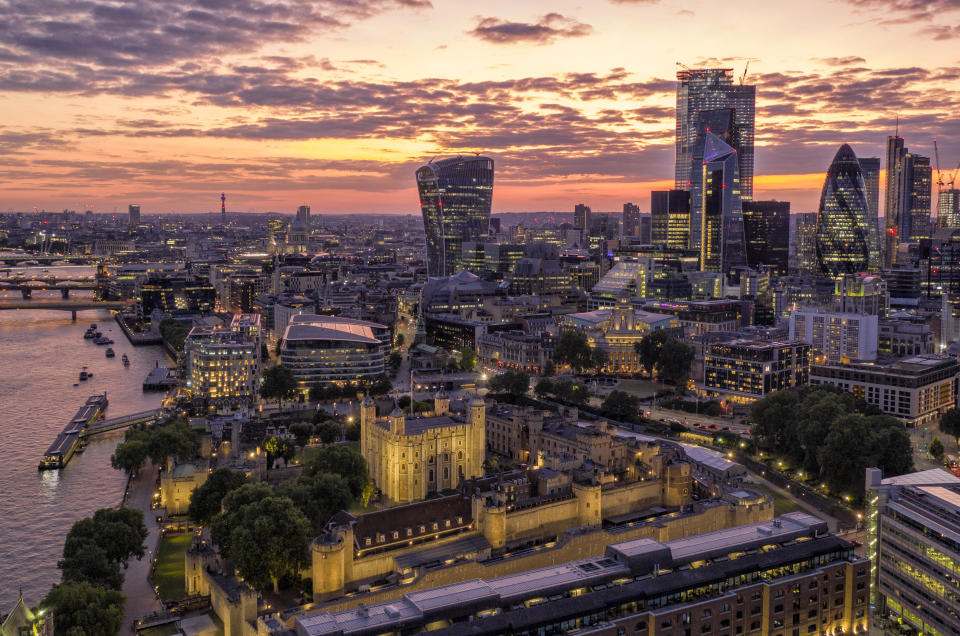 LONDON, UNITED KINGDOM - JULY 13: (EDITORS NOTE: This image was processed using digital filters) The Tower of London is lit up as the sun sets behind the city of London on Saturday night on July 13, 2019 in London, United Kingdom.The Tower of London was built by William the Conqueror in 1078. (Photo by Chris Gorman/Getty Images)