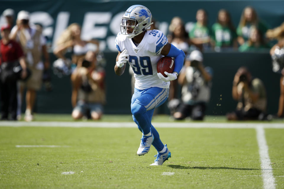 Detroit Lions' Jamal Agnew returns a kick off for a touchdown during the first half of an NFL football game against the Philadelphia Eagles, Sunday, Sept. 22, 2019, in Philadelphia. (AP Photo/Matt Rourke)