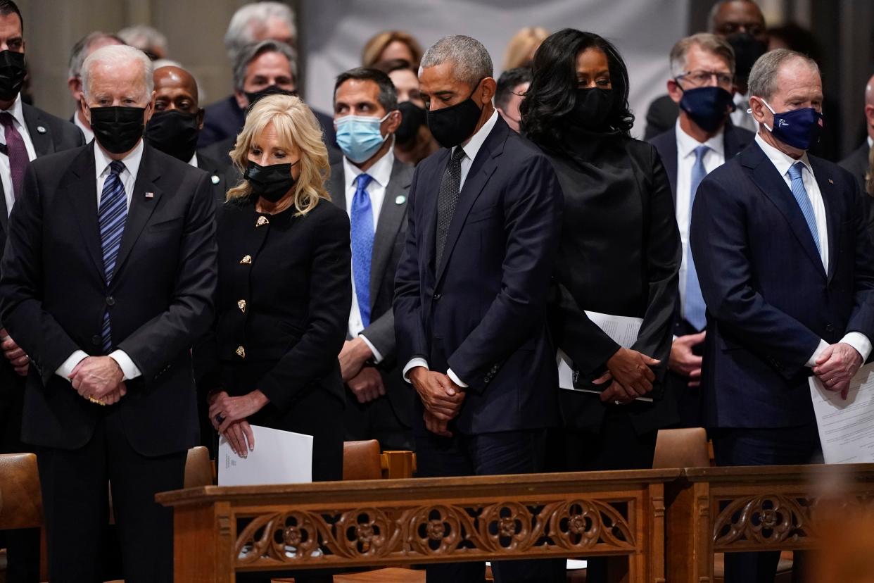 President Biden, First Lady Jill Biden, former President Barack Obama, former first lady Michelle Obama and former President George W. Bush stand during a prayer during the funeral for former Secretary of State Colin Powell. 