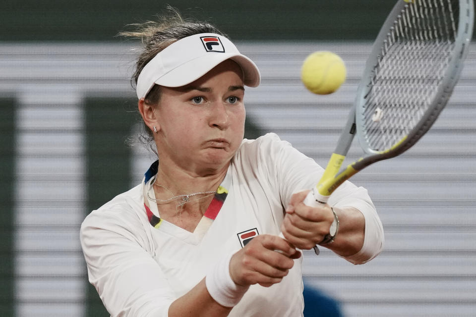 Barbora Krejcikova of the Czech Republic plays a shot against France's Diane Parry during their first round match at the French Open tennis tournament in Roland Garros stadium in Paris, France, Monday, May 23, 2022. (AP Photo/Thibault Camus)