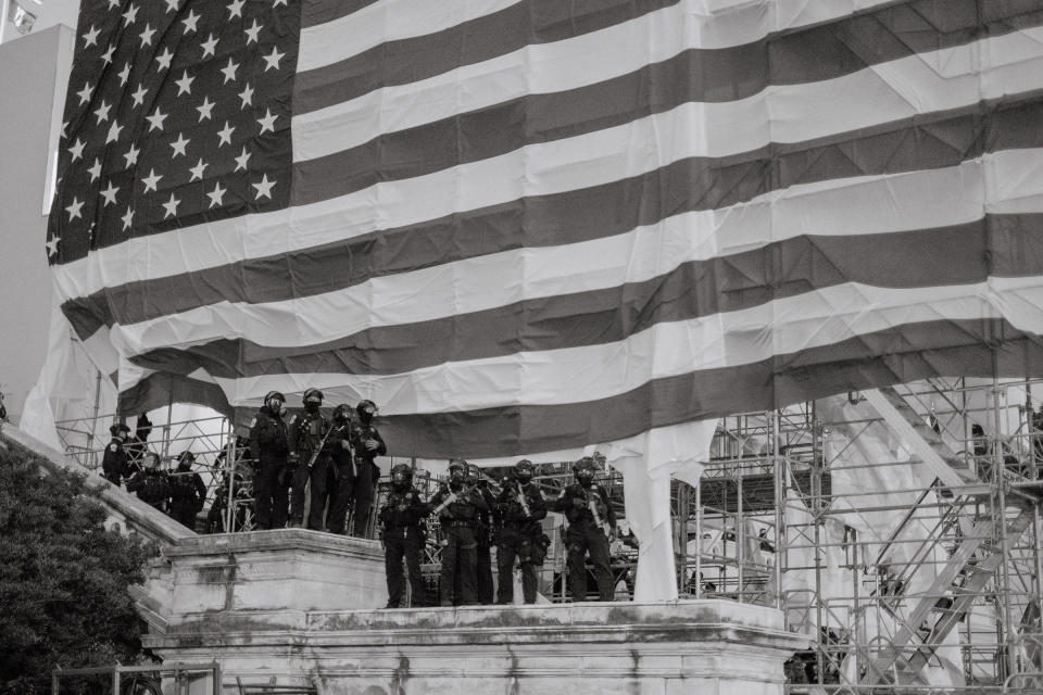 Capitol Police stand guard outside of the Capitol after it was broken into by a pro-Trump mob.<span class="copyright">Christopher Lee for TIME</span>