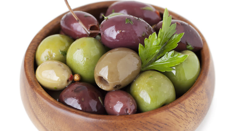 Olives in wooden bowl