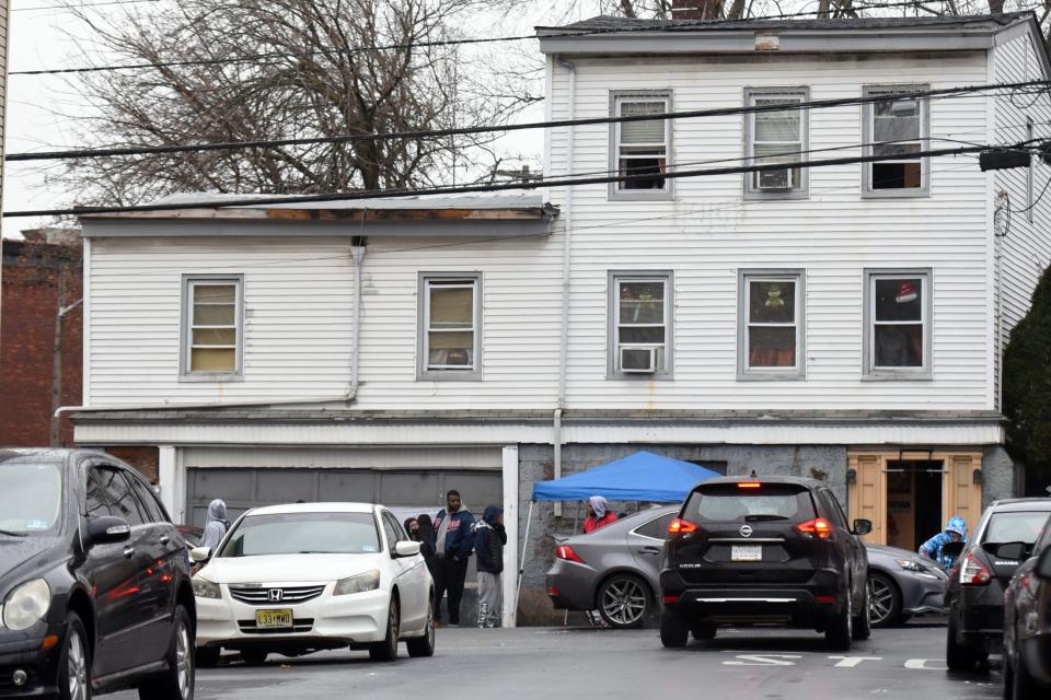 A Paterson police officer fatally shot an armed man on E. Main St. near the intersection of Hillman St. on Wednesday night, December 29, 2021 confirmed Paterson Mayor Andre Sayegh. A memorial with candles is set up on E. Main St. on Thursday morning, December 30, 2021.