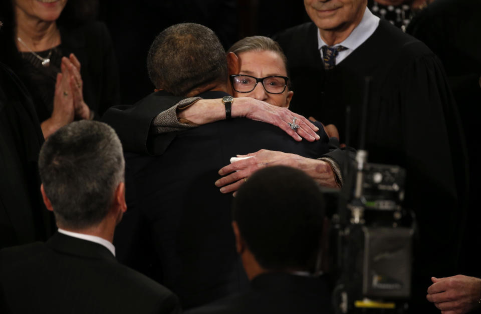 President Barack Obama hugs Ginsburg as the president arrives to deliver his State of the Union address. (Photo: Jonathan Ernst/Reuters)