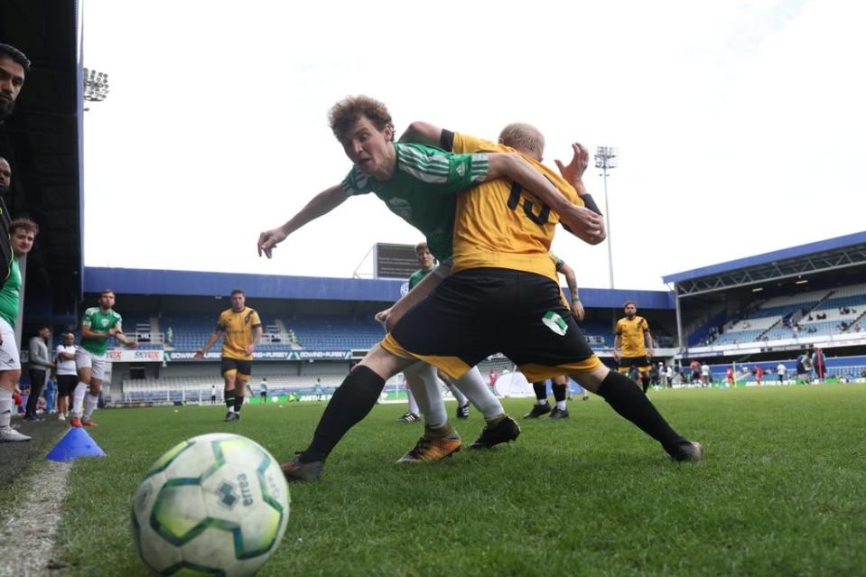 AFC South London player Theo Cox (left), tackles during a match against Westbourne United at the Grenfell Memorial Cup (James Manning/PA) (PA Wire)