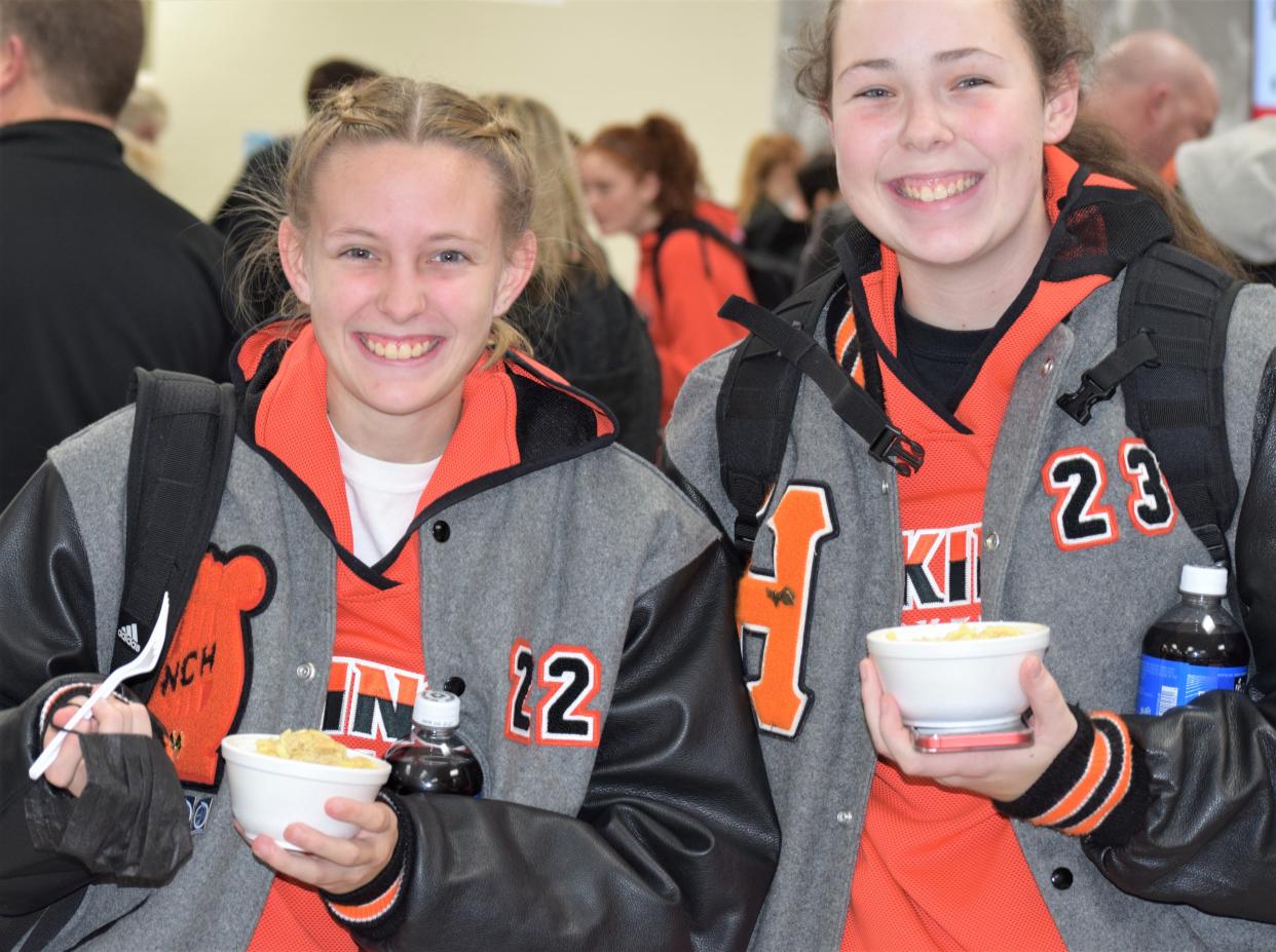 Members of the Hoover Vikings enjoy some chicken noodles after their game against Mount Notre Dame at the Classic in the Country high school girls basketball tournament.