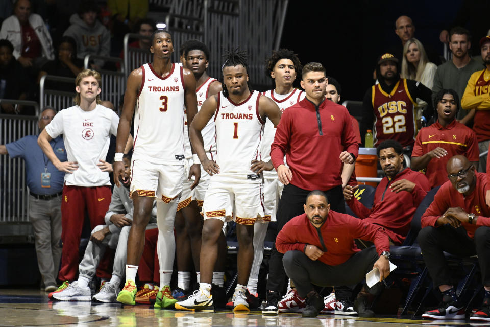 Southern California players look on during the second half of an NCAA college basketball game against Oklahoma Friday, Nov. 24, 2023, in San Diego. (AP Photo/Denis Poroy)