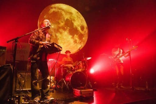 Photo taken on June 5 shows Japanese thumb piano player Sakaki Mango performing in Cape Town. Over the last decade, Mango has become known in his native Japan for mixing the sound of the traditional hand-held metal and wood instrument with songs he composes and sings in Japanese