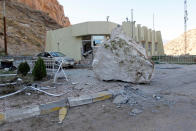 <p>Rocks are seen on the road after an earthquake near the Darbandikhan Dam, close the city of Sulaimaniyah, in the semi-autonomous Kurdistan region, Iraq on Nov. 13, 2017. (Photo: Ako Rasheed/Reuters) </p>