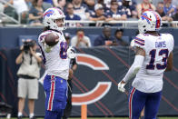 Buffalo Bills' Jacob Hollister celebrates his touchdown pass from quarterback Mitchell Trubisky with Gabriel Davis during the first half of an NFL preseason football game Chicago Bears Saturday, Aug. 21, 2021, in Chicago. (AP Photo/Nam Y. Huh)