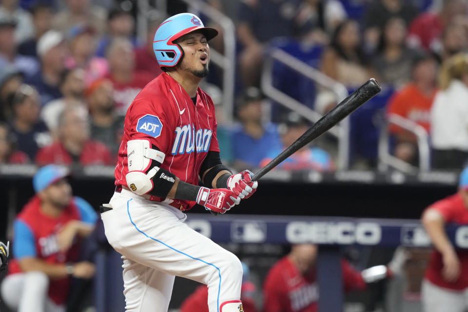 Miami Marlins' Luis Arraez reacts to a fly ball to center field during the fifth inning of a baseball game against the New York Yankees, Saturday, Aug. 12, 2023, in Miami. (AP Photo/Marta Lavandier)