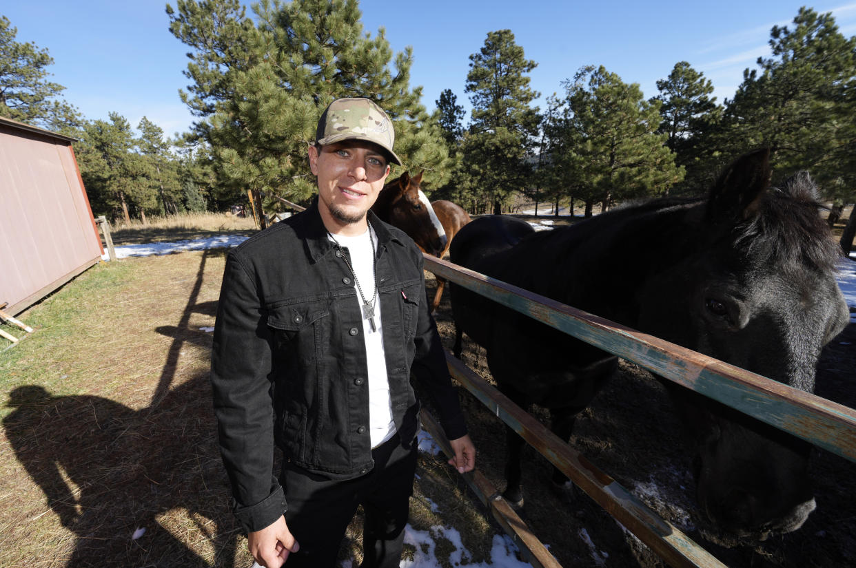 Jason Lopez, a proponent of a Colorado general election ballot measure to decriminalize psychedelic mushrooms, is shown on his family's property Sunday, Oct. 30, 2022, near Morrison, Colo. If the measure is passed by voters next Tuesday, Colorado would become the second state in the union—behind only Oregon—to decriminalize the mushrooms for people 21 and over. (AP Photo/David Zalubowski)