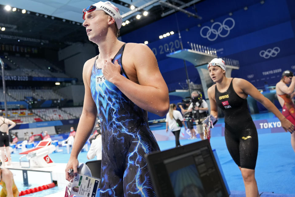 Katie Ledecky of the United States leaves the pool following heat during the women's 400-meter freestyle at the 2020 Summer Olympics, Sunday, July 25, 2021, in Tokyo, Japan. (AP Photo/Martin Meissner)