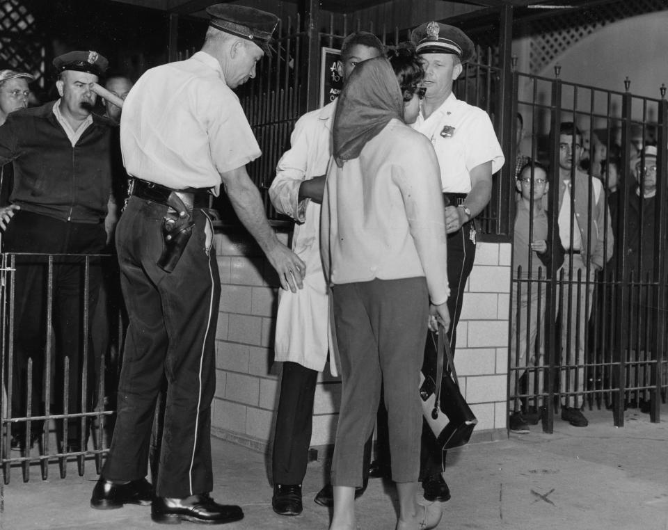 Black demonstrators being arrested after protesting segregation at Fontaine Ferry Park in Louisville, Kentucky, in 1961. The park was among a number of amusement park facilities, mostly in the South, that banned or restricted Black people from entry as the 1960s began, including Gwynn Oak Amusement Park in Baltimore.