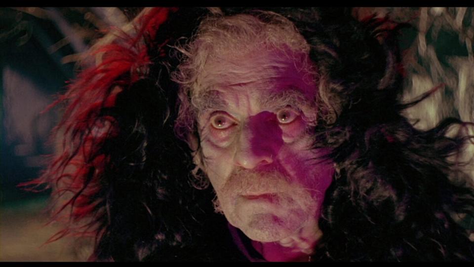 Boris Karloff bathed in pinkish-green light, looking distinctly undead, in Mario Bava's cult movie Black Sabbath.