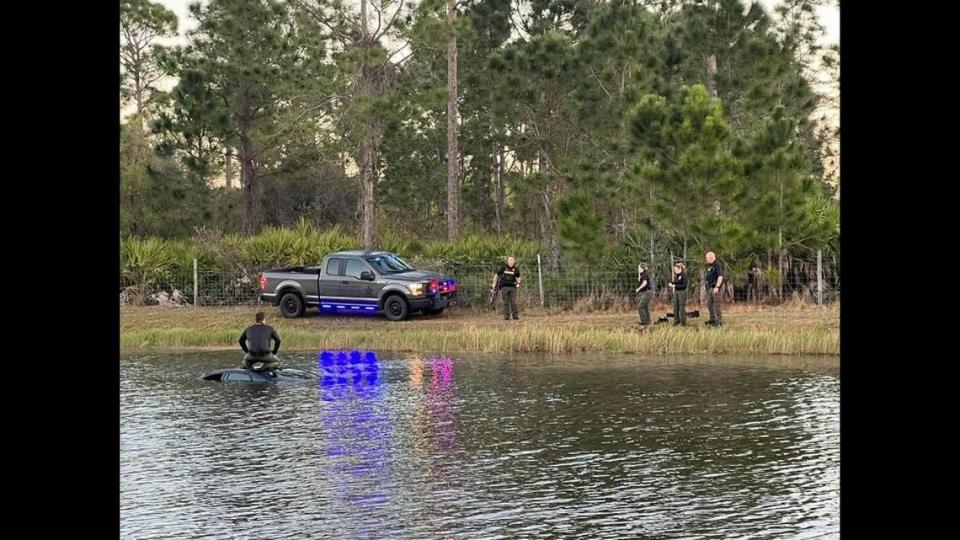 A car found submerged in a Florida lake presented first responders with a unique challenge, when it was discovered a large alligator was standing guard over it, officials say.