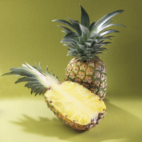 whole and sliced pineapple