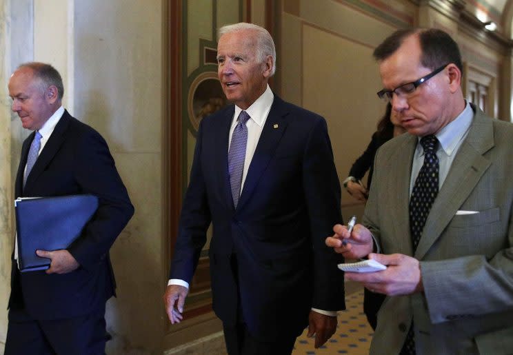 Former Vice President Joseph Biden, center, leaves after meeting with Senate Minority Whip Sen. Richard Durbin, D-Ill., at the Capitol on July 11, 2017, in Washington, D.C. Biden was on the Hill to meet senators about his National Cancer Moonshot initiative. (Photo: Alex Wong/Getty Images)