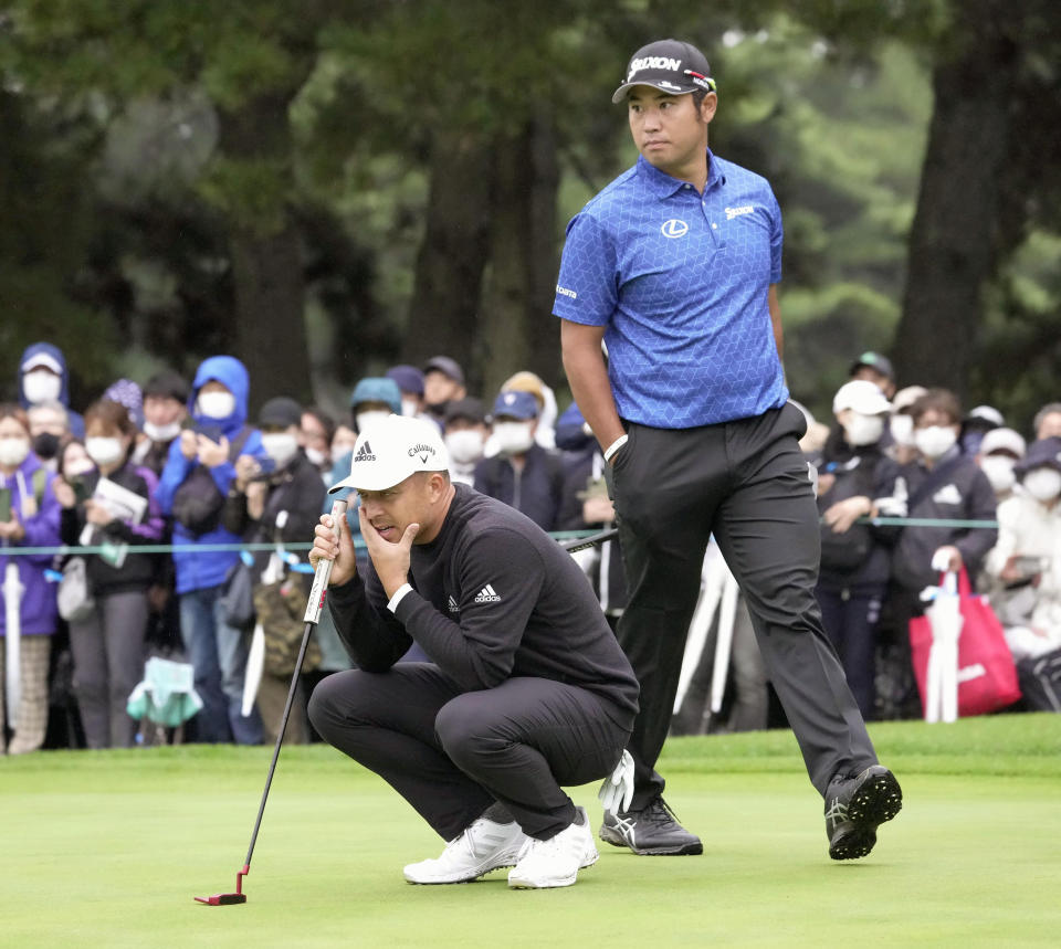 Hideki Matsuyama, right, and Xander Schauffele play at the Zozo Championship in Inzai, Chiba prefecture, Japan Thursday, Oct. 13, 2022. (Kyodo News via AP)