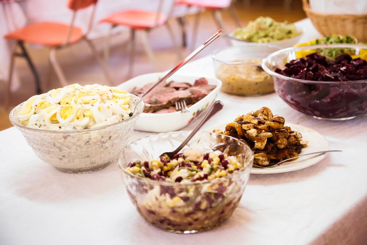 Potluck food on a buffet table