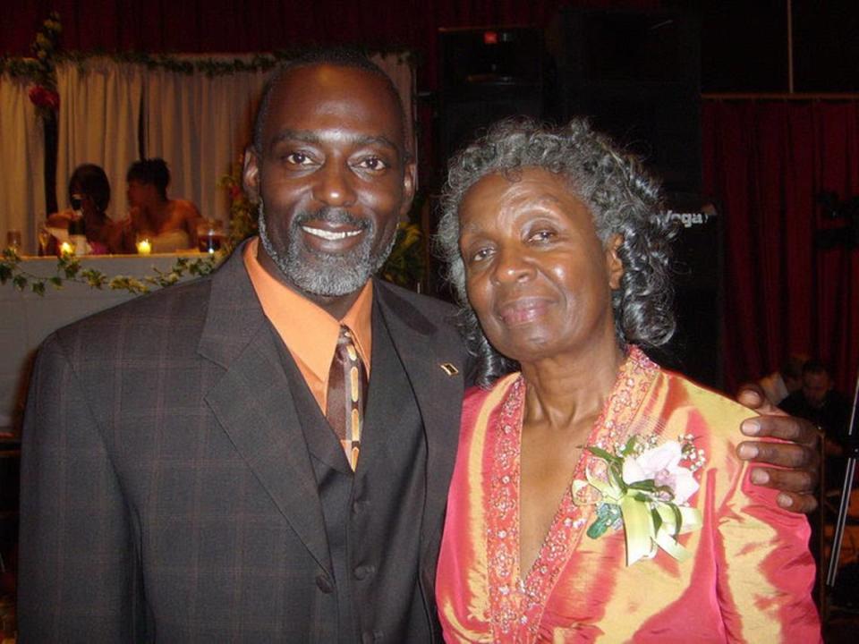 Reuben Holmes and his mother, Willie Mae Holmes, are shown in a 2007 family wedding. Reuben Holmes died this month in Charlotte in a construction fire in SouthPark.