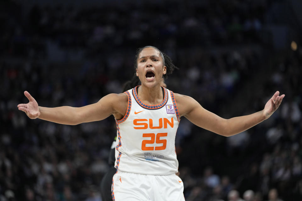 Connecticut Sun forward Alyssa Thomas (25) reacts toward a referee during the first half of Game 5 of a WNBA basketball semifinals game against the Minnesota Lynx, Tuesday, Oct. 8, 2024, in Minneapolis. (AP Photo/Abbie Parr)