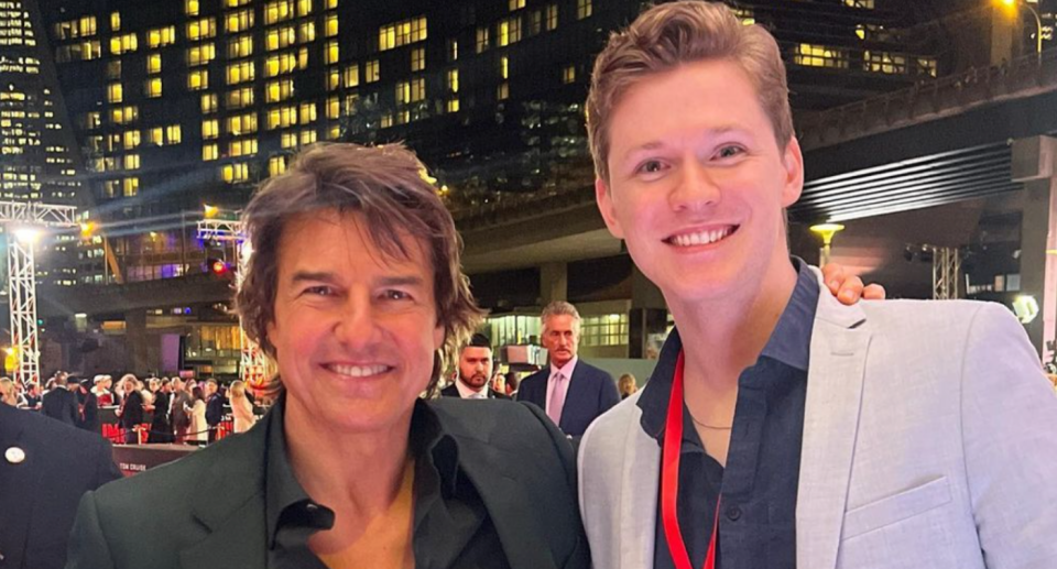 Tom Cruise standing next to Taylor Reilly