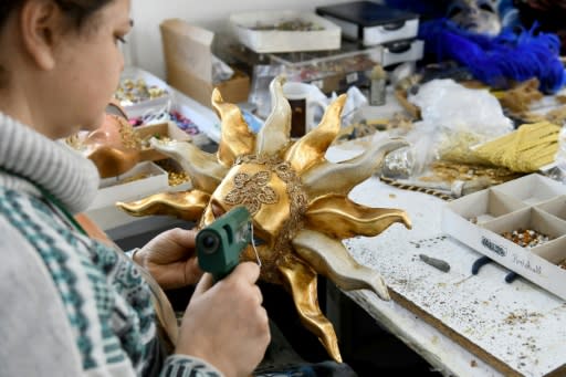 The masks range from relatively simple eye-coverings to towering, ornate head pieces, which can sell for up to 1,500 euros ($1,620)