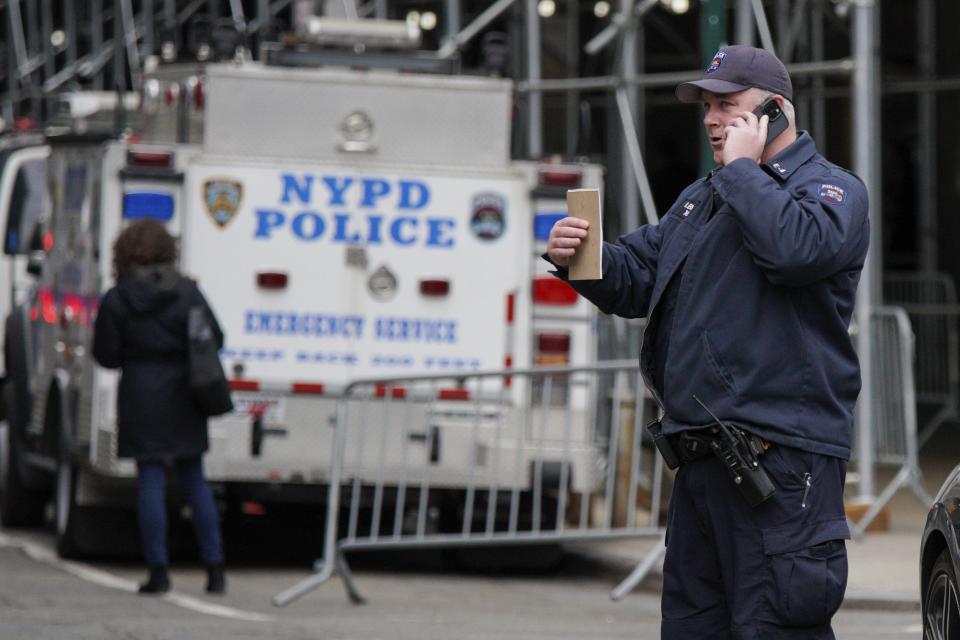 New York Police Department officers of the emergency service unit arrive at the courthouse after powder in an envelope meant for the district attorney's office was found, Friday, March 24, 2023, in New York. A non-threatening powdery substance was found Friday in an envelope marked “Alvin” in a mailroom at the offices of Manhattan District Attorney Alvin Bragg, the latest security scare as the prosecutor weighs a potential historic indictment of former President Donald Trump, authorities said. (AP Photo/Eduardo Munoz Alvarez)