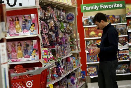 A shopper looks at a toy during Black Friday Shopping at a Target store in Chicago, Illinois, United States, November 27, 2015. REUTERS/Jim Young