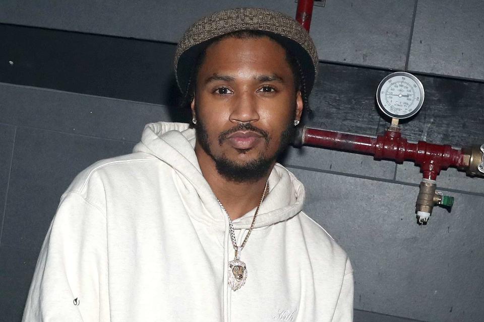 <p>Johnny Nunez/WireImage</p> Trey Songz poses for an image at Nebula in New York City in December 2022