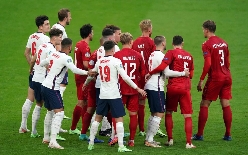 England and Denmark players bunch together as they mark each other for a free kick during the UEFA Euro 2020 semi final match at Wembley Stadium - Mike Egerton/PA Wire