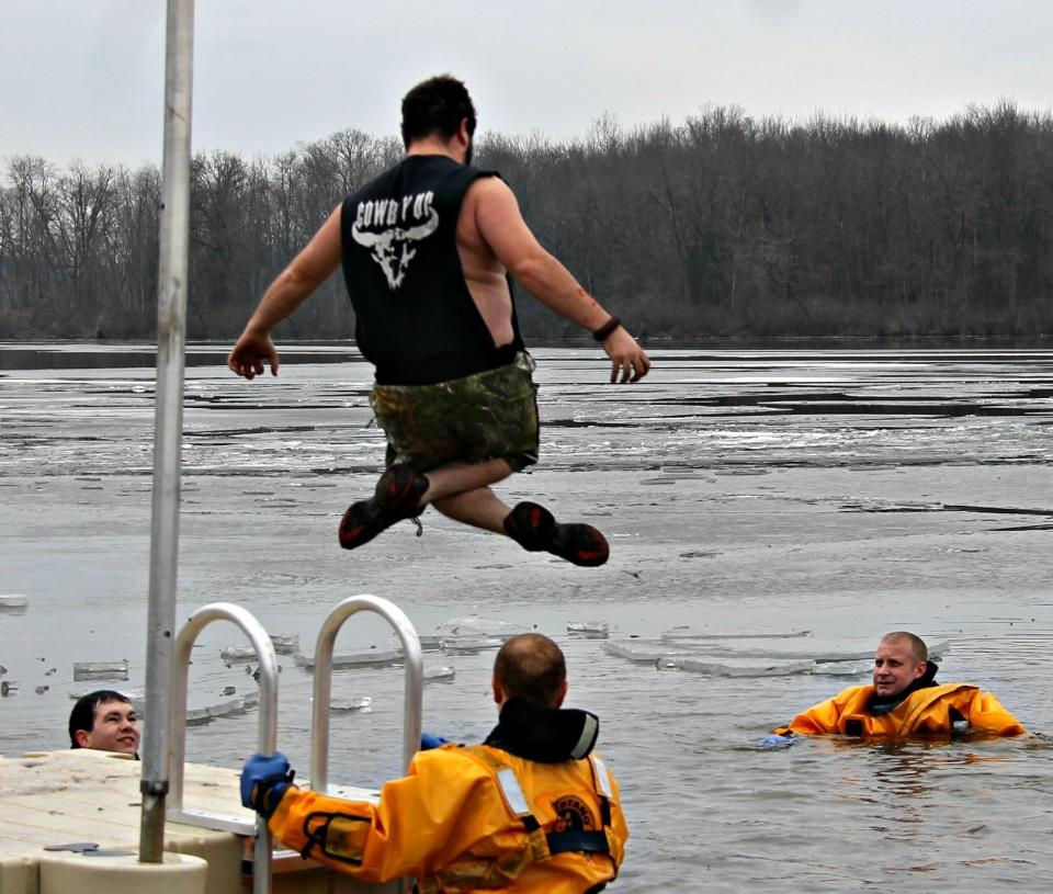 The 2017 Polar Bear Splash did not have enough ice so swimmers jumped from a pier into Marle Lake's frigid waters.