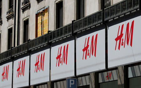 FILE PHOTO: Logos of H&M are pictured on a store in Geneva, Switzerland, August 16, 2018. REUTERS/Denis Balibouse/File Photo