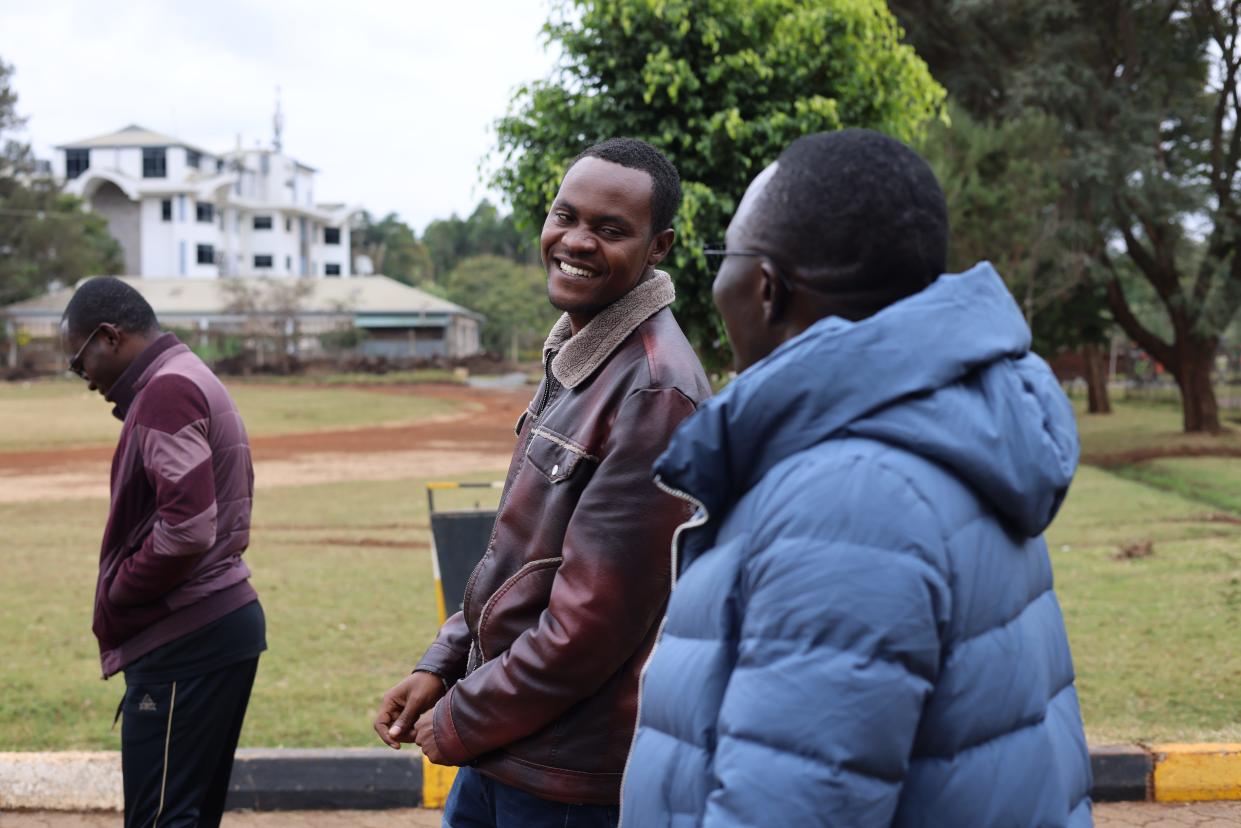 Seminarians laugh together outside their classroom building in a Nairobi, Kenya, neighborhood that's so dense with churches and religious orders that it's nicknamed the "Little Vatican."