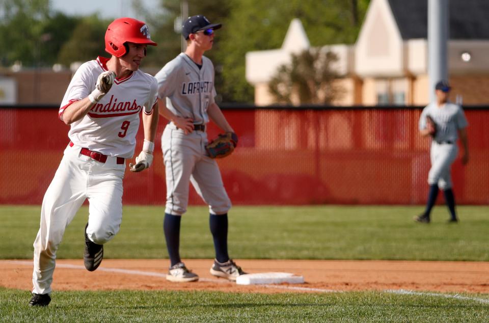 Twin Lakes Clayton Burton (9) rounds third base during the IHSAA baseball game against the Central Catholic Knights, Wednesday, May 8, 2024, at the Twin Lakes High School in Monticello, Ind. Twin Lakes won 5-2.
