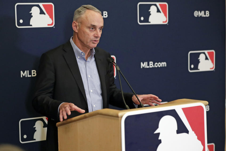 MLB Commissioner Rob Manfred answers questions at a press conference during MLB baseball owners meetings, Thursday, Feb. 6, 2020, in Orlando, Fla. (AP Photo/John Raoux)