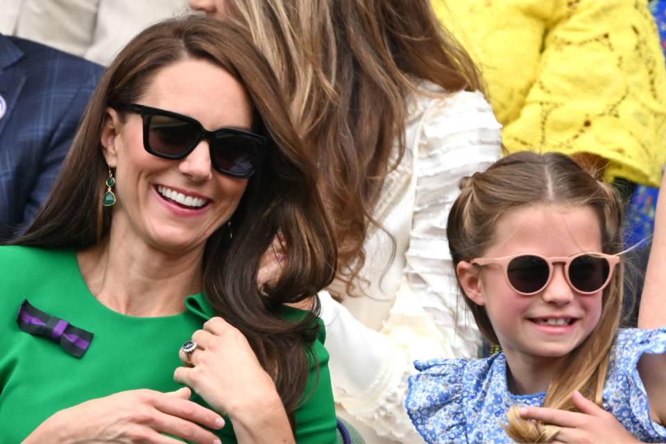 <p>Karwai Tang/WireImage</p> Kate Middleton and Princess Charlotte at Wimbledon in July 2023