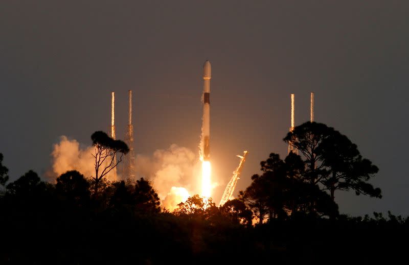 FILE PHOTO: A SpaceX Falcon 9 rocket lifts off with a payload of 21 Starlink satellites from the Cape Canaveral Space Force Station