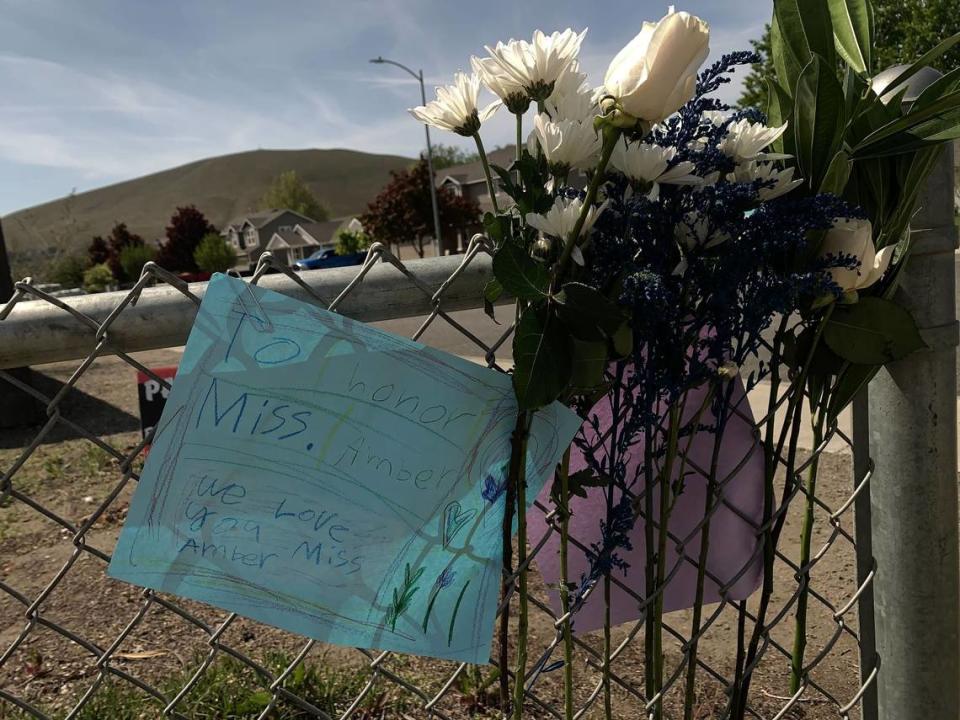 Flowers were placed at William Wiley Elementary School in West Richland, Wash., after paraeducator Amber M. Rodriguez was shot outside the school.