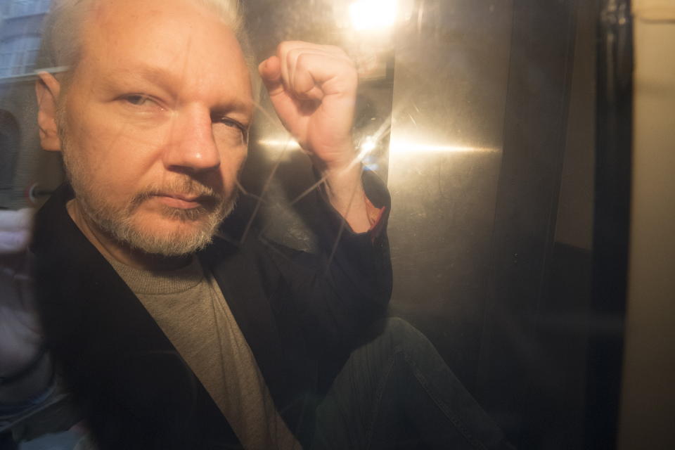 Wikileaks co-founder Julian Assange, in a prison van, as he leaves Southwark Crown Court in London on May 1, 2019. Source: AAP