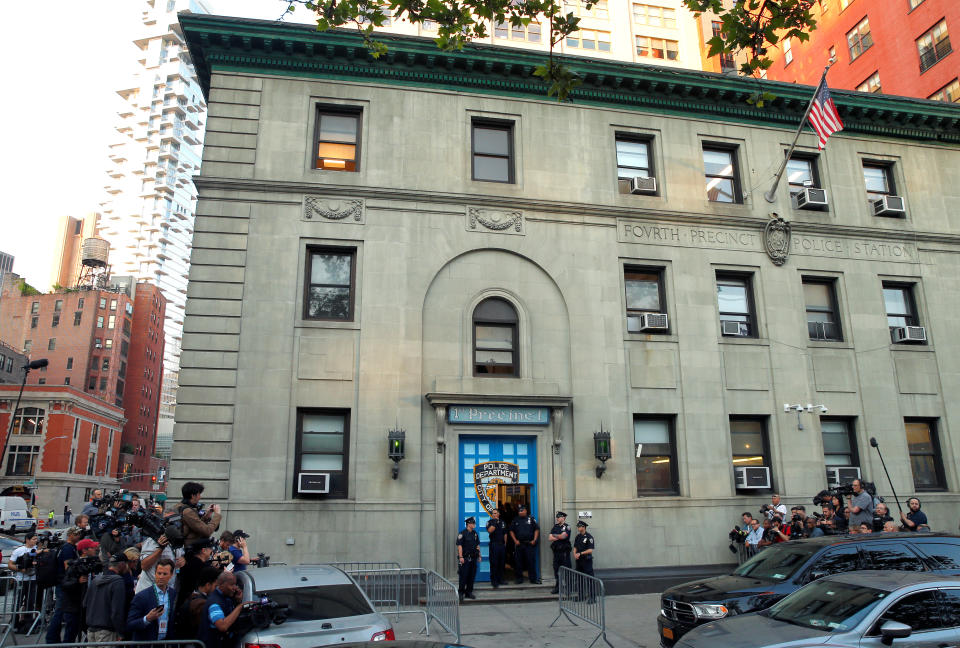 <p>Members of the media stand next to the 1st Precinct in Manhattan as film producer Harvey Weinstein is expected to arrive, in New York, May 25, 2018. (Photo: Mike Segar/Reuters) </p>